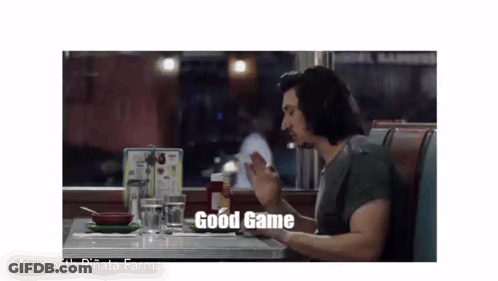 Man Sitting At Diner Table With Ketchup And Phone GIF