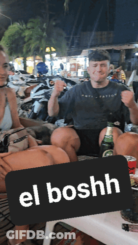 Man Sitting At El Boshhh Sign GIF