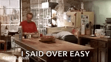 Man Sitting At Kitchen Table Saying Over Easy GIF