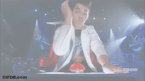 Man Sitting At Microphone GIF