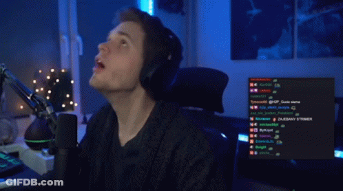 Man Sitting At Microphone Looking Up GIF