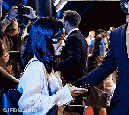 Man Sitting At Microphone Next To Spider-Man No Way Home Poster GIF