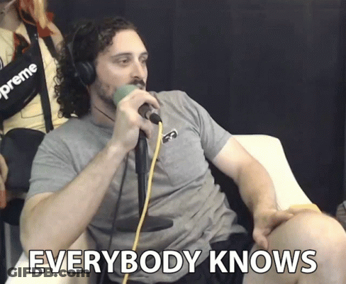 Man Sitting At Microphone Saying Everybody Knows GIF