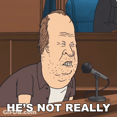 Man Sitting At Microphone Saying He's Not Really GIF