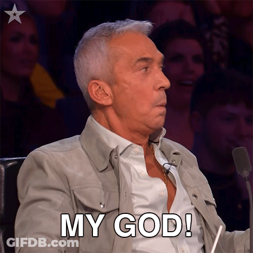 Man Sitting At Microphone Saying My God GIF