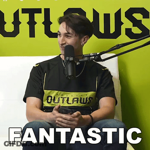 Man Sitting At Microphone With Fantastic GIF