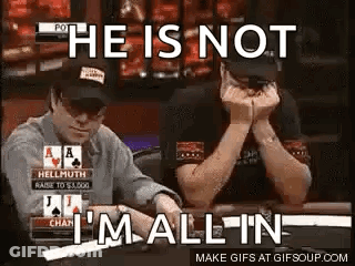 Man Sitting At Poker Table With Hands Folded GIF