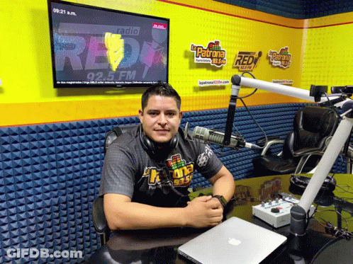 Man Sitting At Radio Microphone GIF