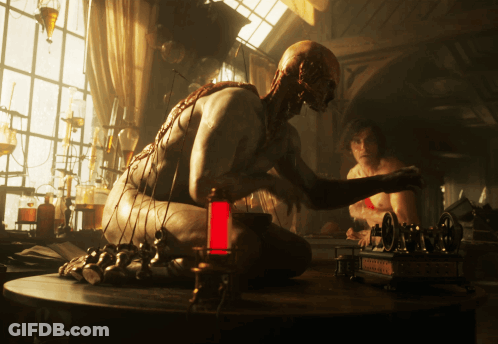 Man Sitting At Singer Sewing Machine GIF