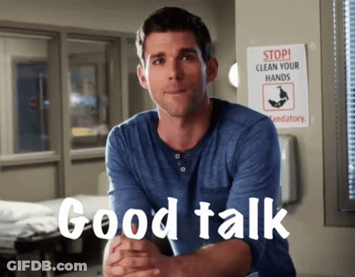 Man Sitting At Stop Clean Your Hands Sign GIF