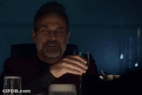 Man Sitting At Table Drinking Wine GIF