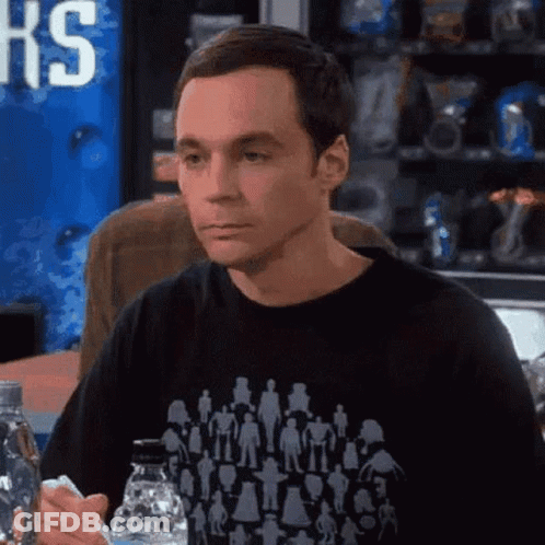 Man Sitting At Table Holding Water And Phone GIF