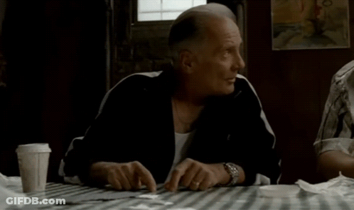 Man Sitting At Table Saying He's Gotta Go GIF