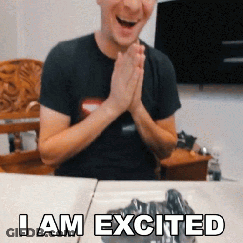 Man Sitting At Table Saying I Am Excited GIF
