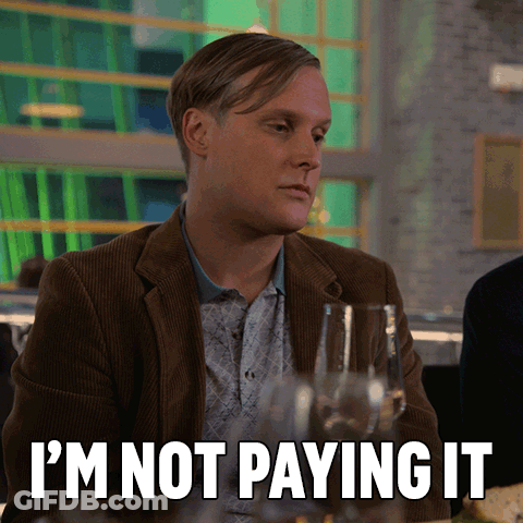 Man Sitting At Table Saying I'm Not Paying GIF