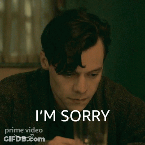 Man Sitting At Table Saying I'm Sorry GIF