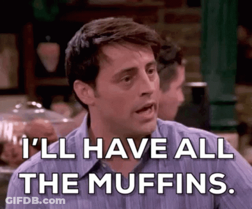 Man Sitting At Table Says I'll Have All The Muffins GIF