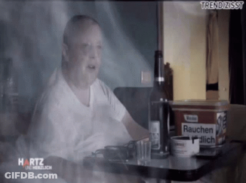 Man Sitting At Table With Beer And Marlboro Cigarettes GIF