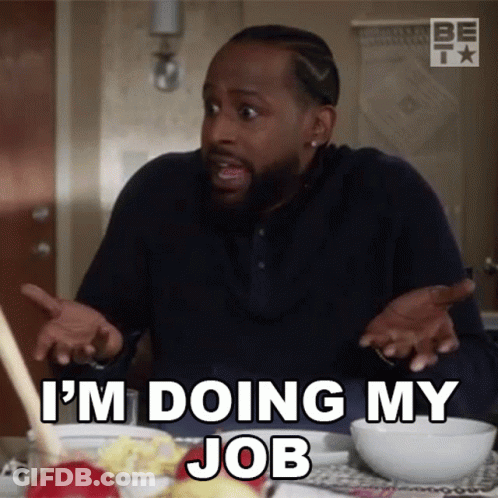Man Sitting At Table With Bowl Of Food Saying I'm Doing My Job GIF