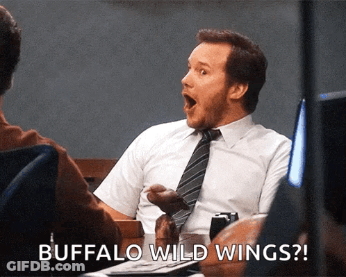 Man Sitting At Table With Buffalo Wild Wings GIF