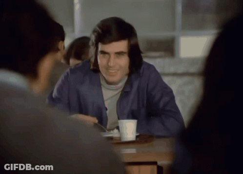 Man Sitting At Table With Coffee GIF