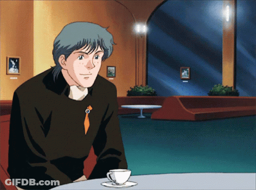 Man Sitting At Table With Coffee GIF