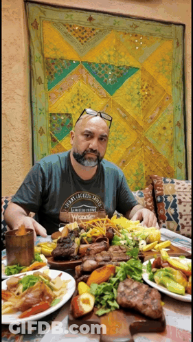 Man Sitting At Table With Food And Twenty Jackson Shoes Shirt GIF