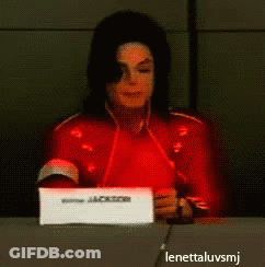 Man Sitting At Table With Jackson Sign GIF