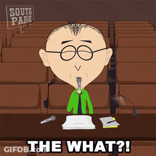 Man Sitting At Table With Microphone Saying What GIF