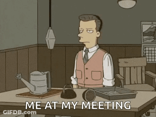 Man Sitting At Table With Newspaper And Watering Can GIF