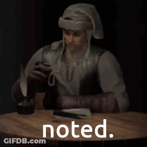 Man Sitting At Table With Noted GIF