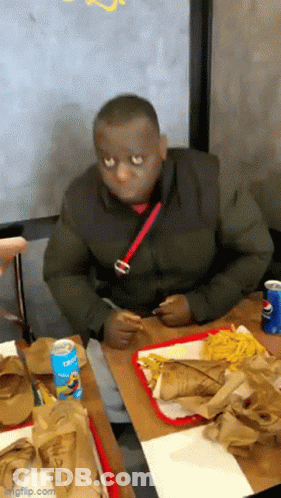 Man Sitting At Table With Pepsi Can GIF