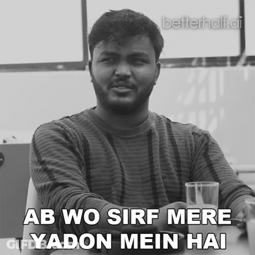 Man Sitting At Table With Water Saying Ab Wo Sirf Mere Yadon Mein Hai GIF