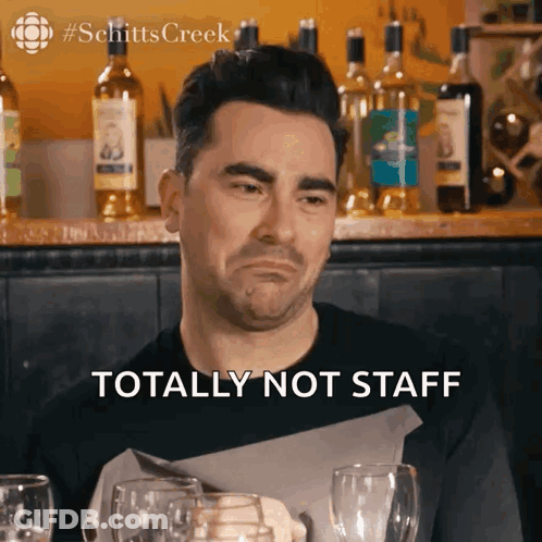 Man Sitting At Table With Wine Totally Not Staff GIF