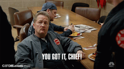Man Sitting At Table With You Got It Chief GIF