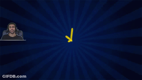 Man Sitting Before Blue And Yellow Starburst GIF