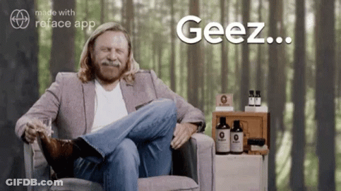 Man Sitting Cross-Legged Saying Geez GIF