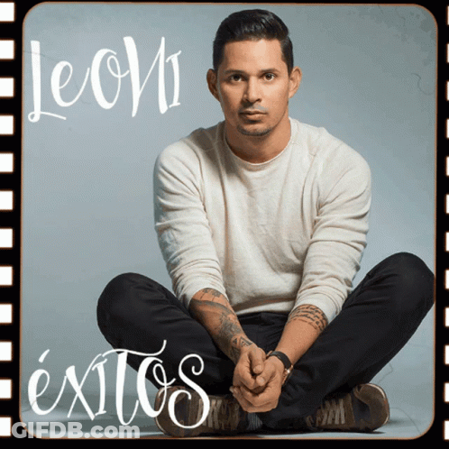 Man Sitting Cross-Legged With Exitos Above GIF