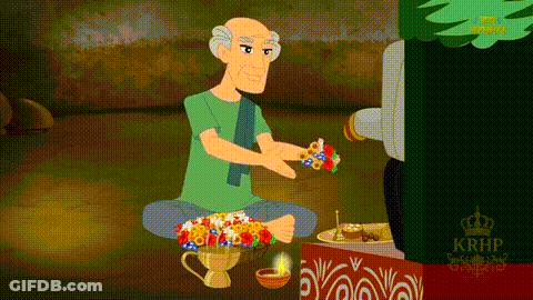 Man Sitting Floor With Flowers Box Saying Krhp GIF