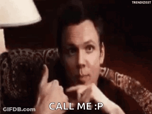 Man Sitting Giving Thumbs Up Call Me P GIF