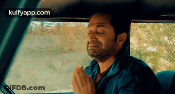 Man Sitting In Back Seat Eyes Closed GIF