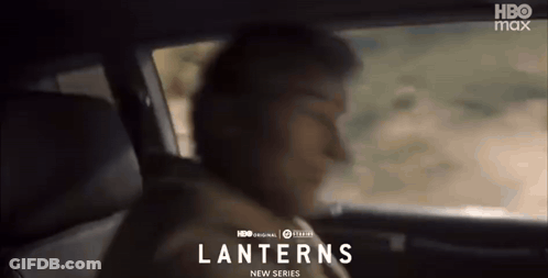 Man Sitting In Back Seat Looking Out Window GIF