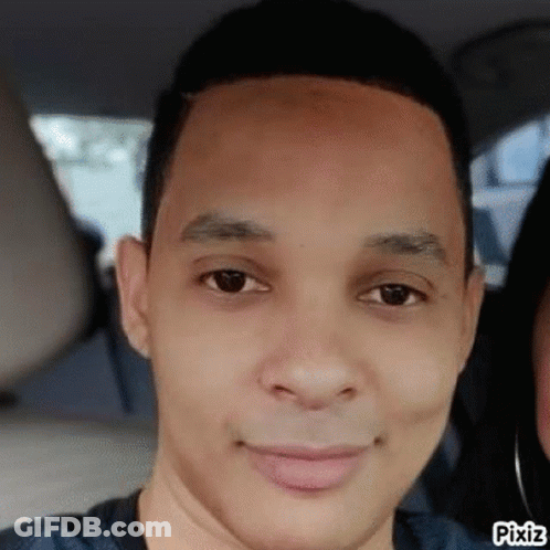 Man Sitting In Back Seat Of Car With Woman GIF
