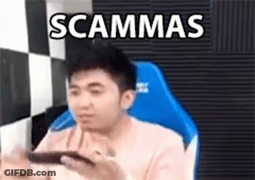 Man Sitting In Blue Chair Holding Cell Phone GIF