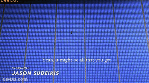Man Sitting In Blue Seats GIF