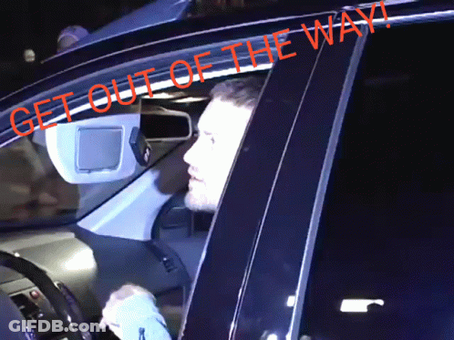 Man Sitting In Car Saying Get Out Of The Way GIF