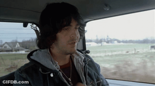 Man Sitting In Car Smoking GIF