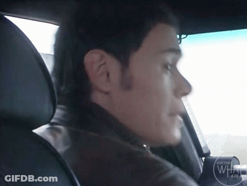 Man Sitting In Car With Doctor Logo GIF