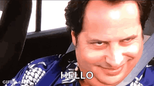 Man Sitting In Car With Hello On Face GIF