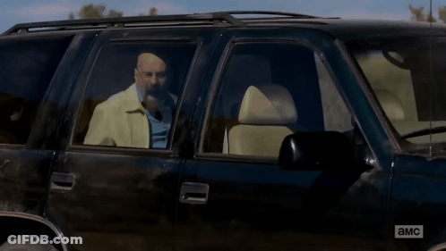 Man Sitting In Car With Letters A And MC GIF